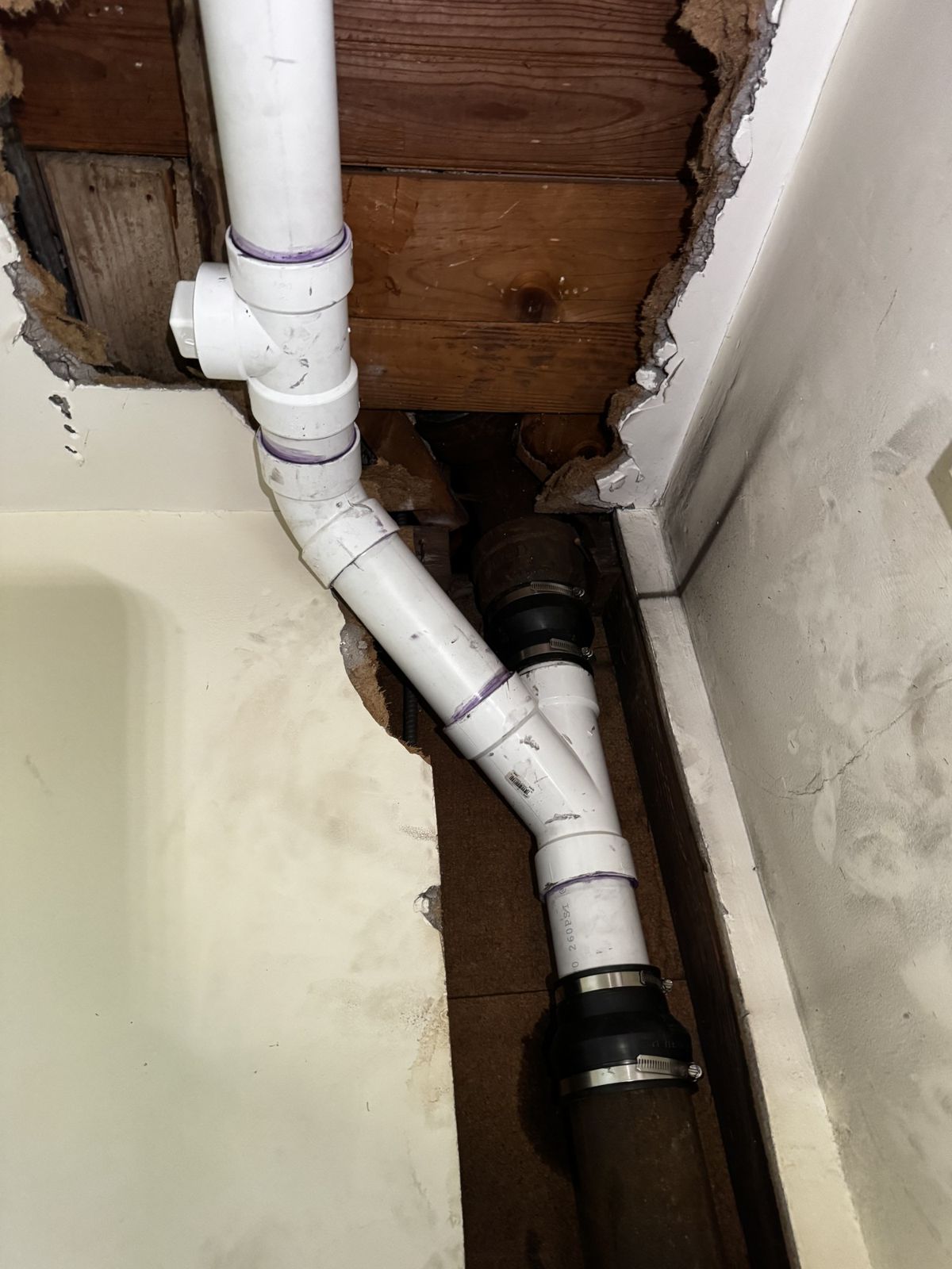New water and drain lines roughed in inside an older home